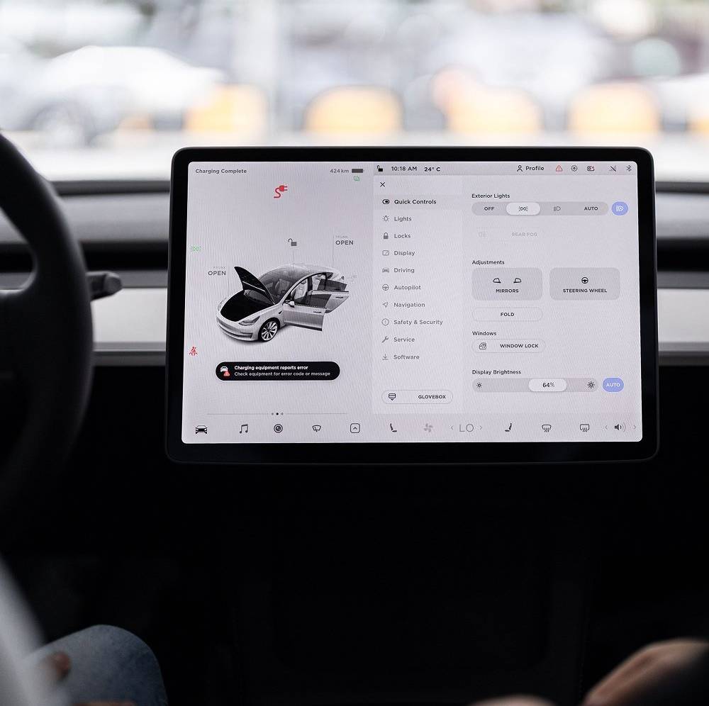 Tesla touchscreen displaying vehicle settings