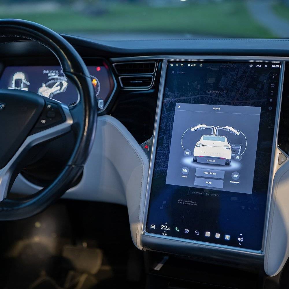 Tesla touchscreen displaying vehicle controls